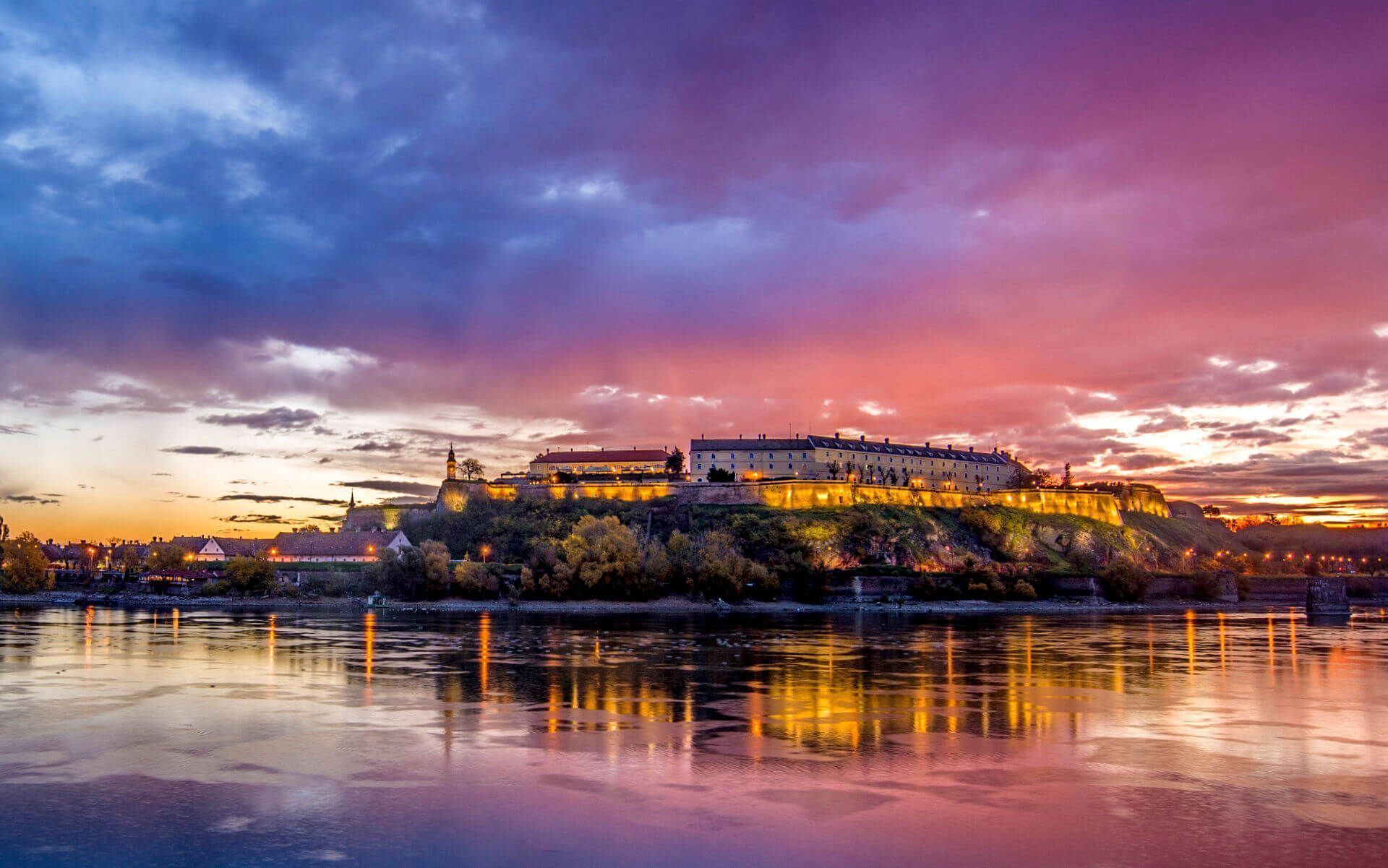Petrovaradin Bridge and Novi Sad at dusk